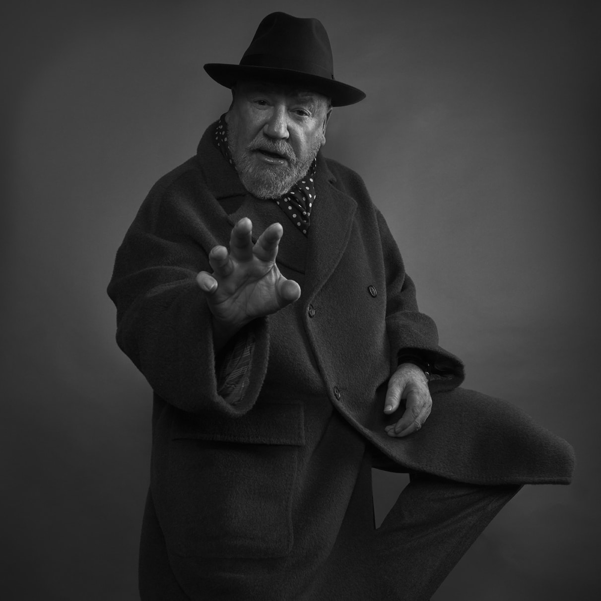 Ray wears Hat by Herbert Johnson, Coat and Scarf by Connoly // 📸 : Gavin Bond